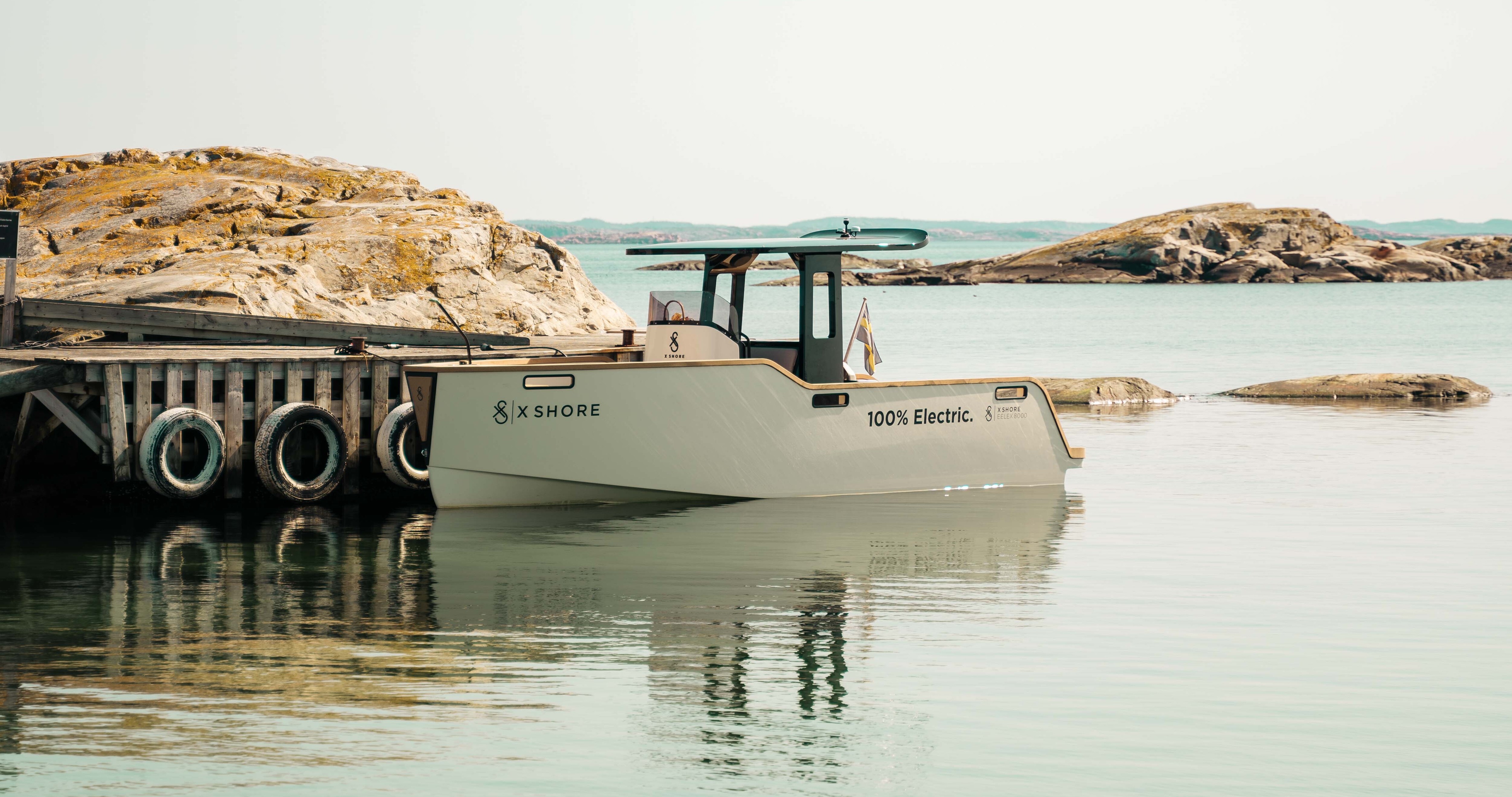 A X Shore boat docked in a nature harbour