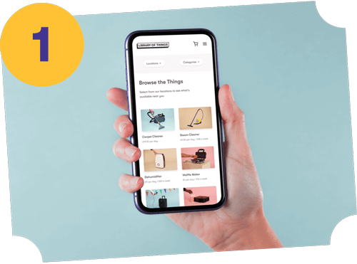 Hand holding a smartphone looking at the online catalogue