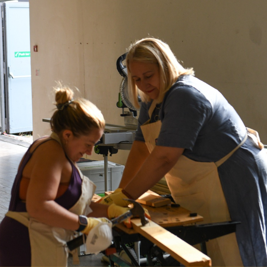 Image of two women using DIY tools