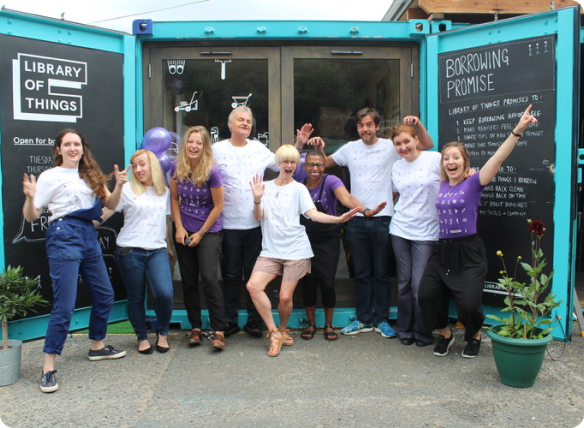 Library of Things team celebrating outside their shipping container testbed