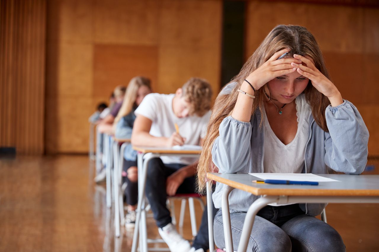 Teenage Student struggling in class