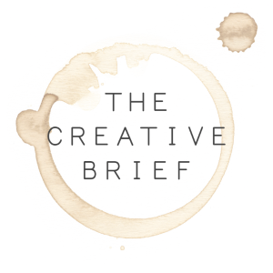 Logo. A coffee mug stain saying "The Creative Brief"