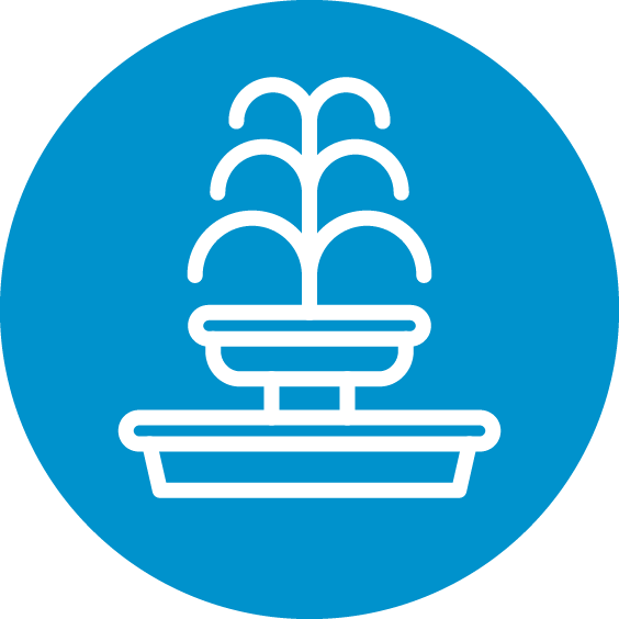 A circular blue icon with a white graphic of a fountain on it.