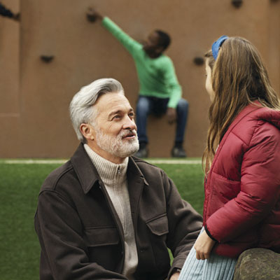 Man Talking to Child
