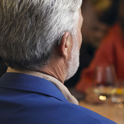 Man Wearing Hearing Aid Rear View