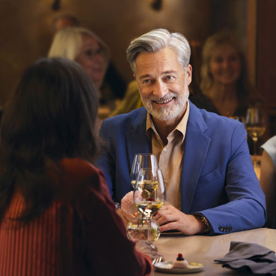 Man in Restaurant with Woman