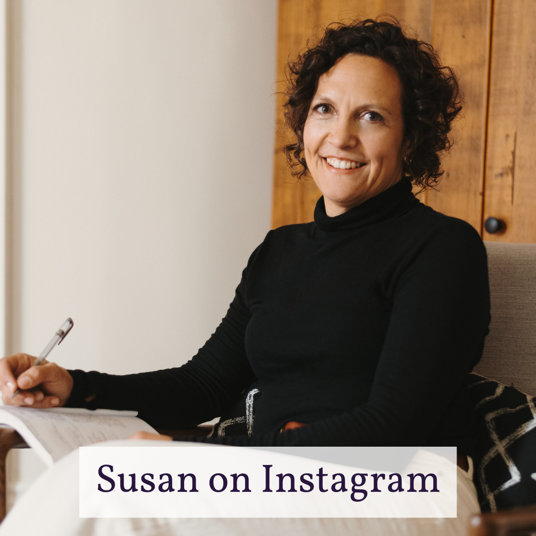 Author, Susan Baker, poses with a mug.
